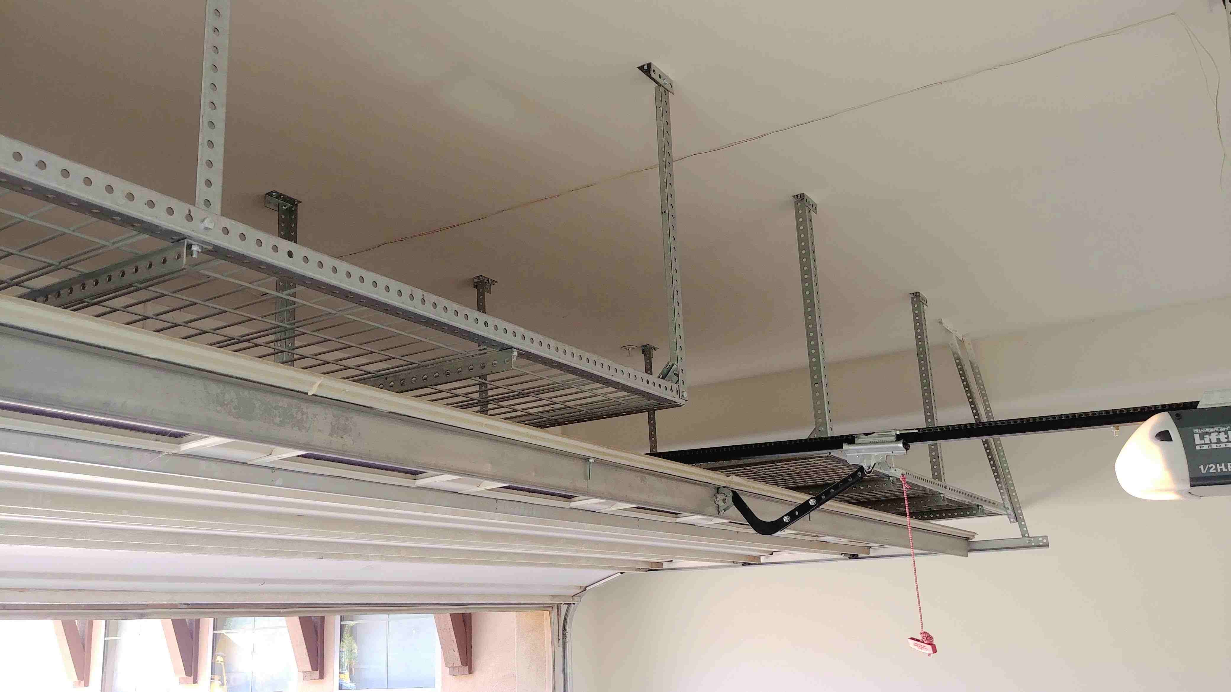 Organized garage with overhead storage