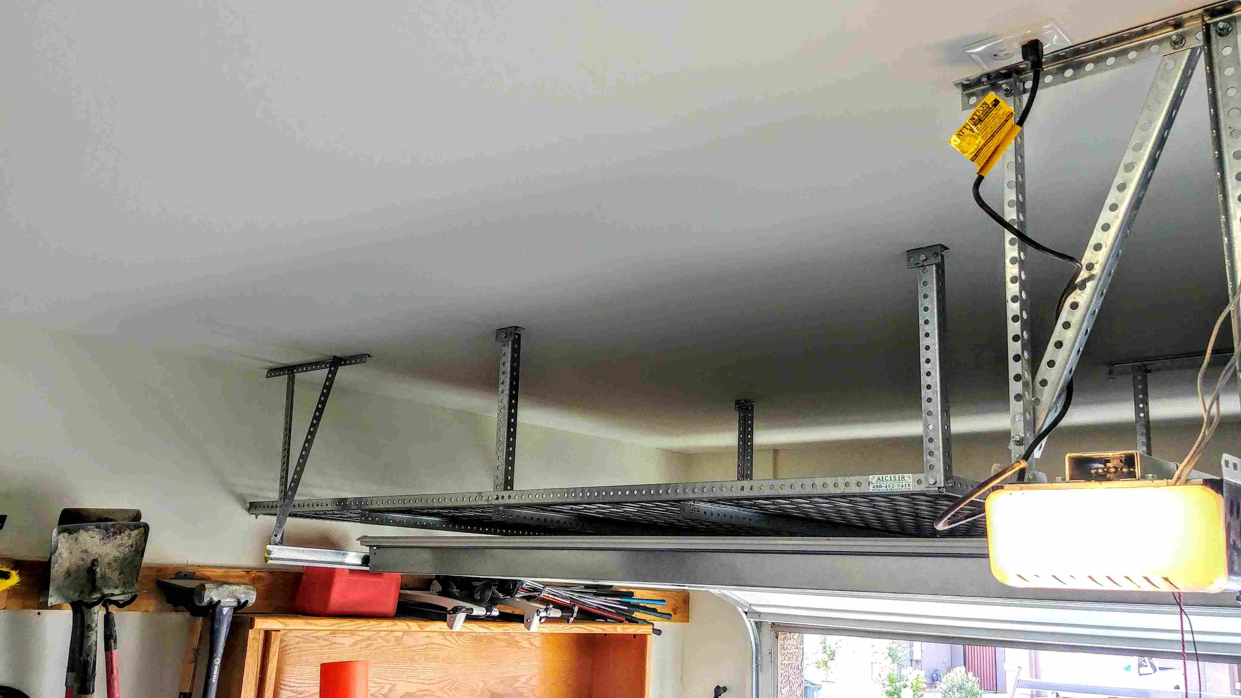 Custom overhead garage storage installation