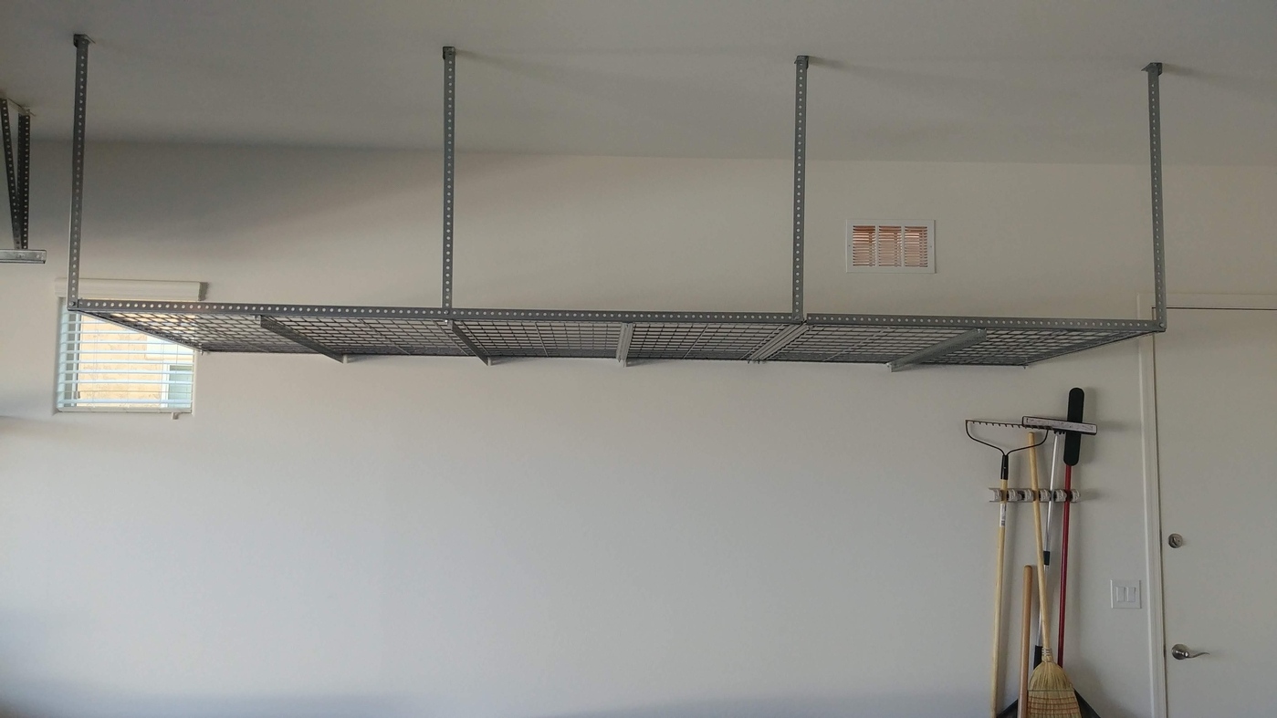 Six overhead ceiling storage racks for maximum capacity