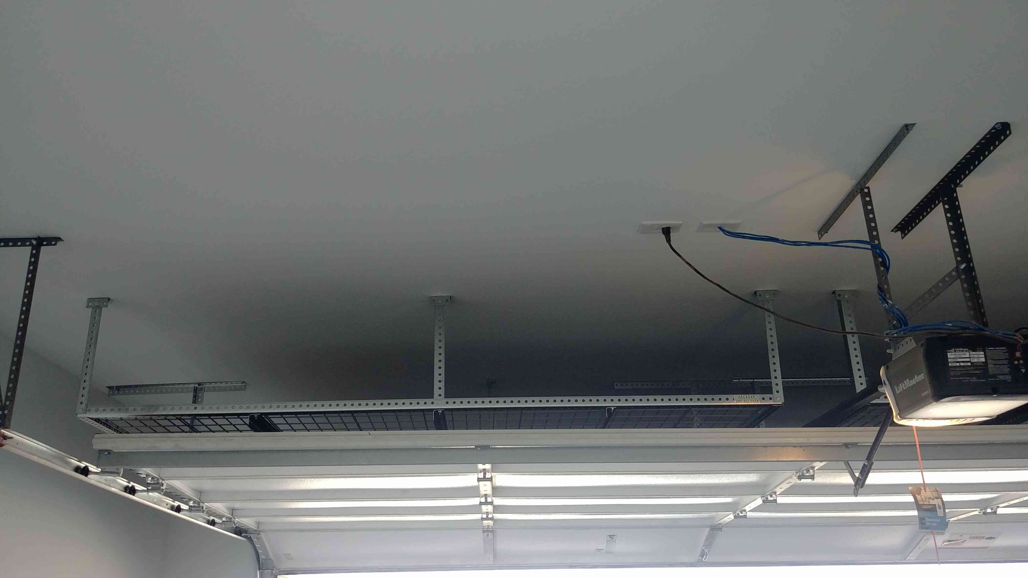 Ceiling mounted storage racks