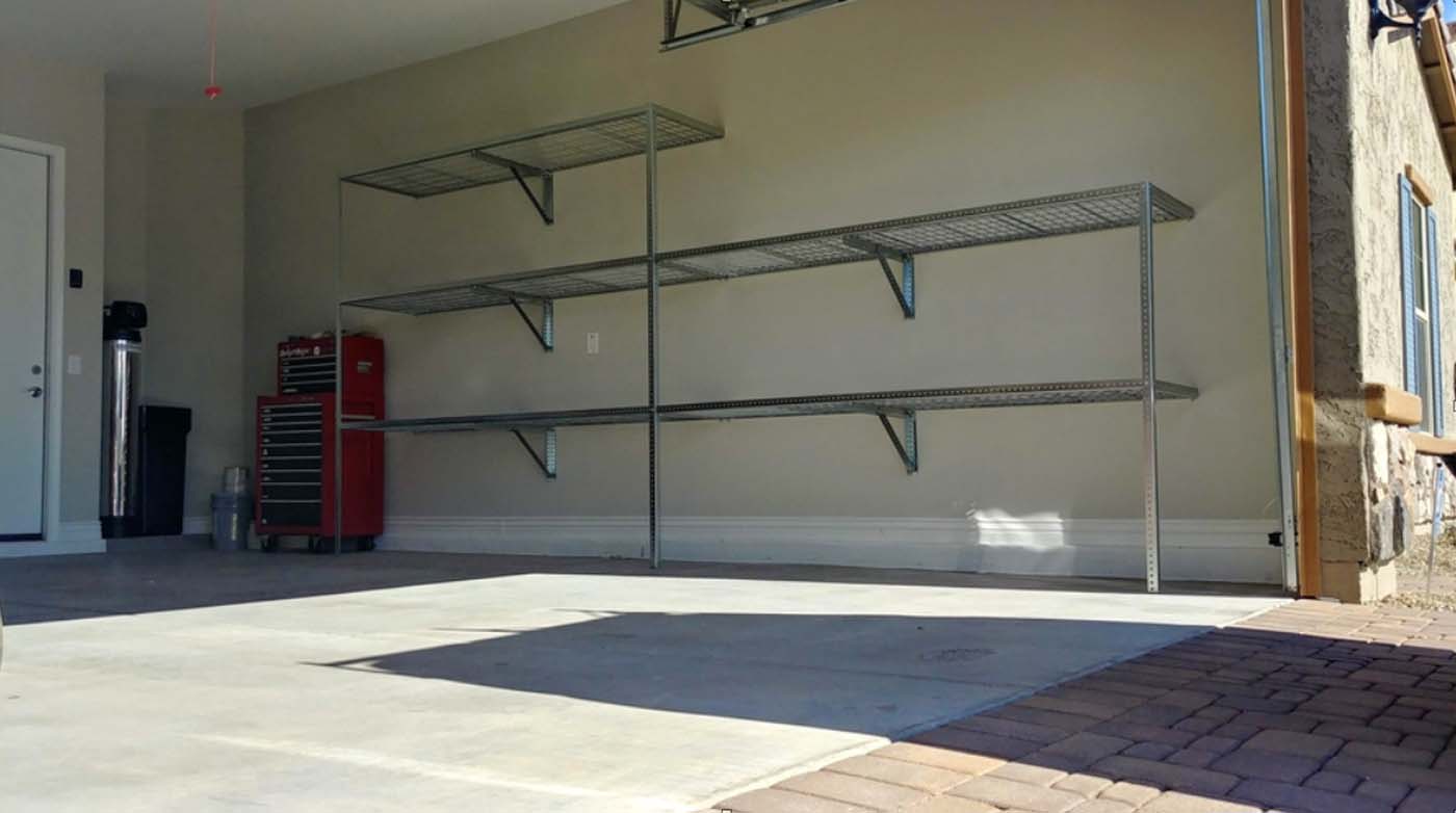Five heavy duty steel shelves professionally installed
