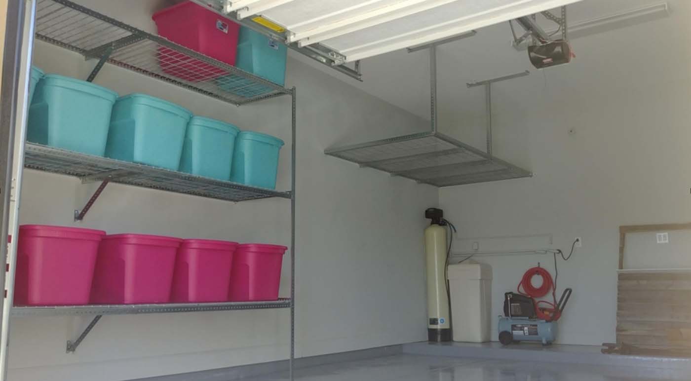 Three extended 12ft by 2ft steel shelves